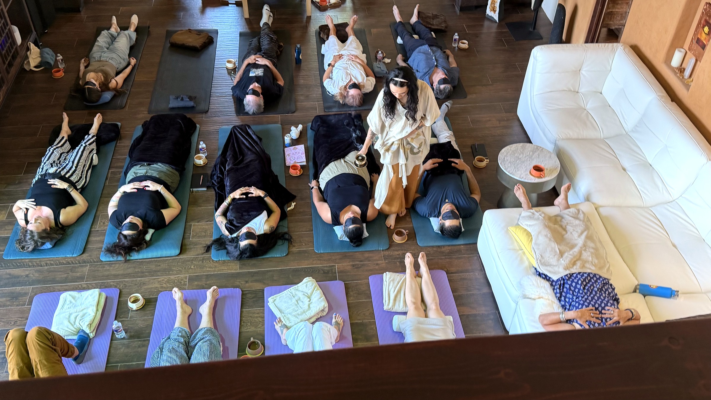 The ranch studio filled with guests receiving the Echo Salon sound bath