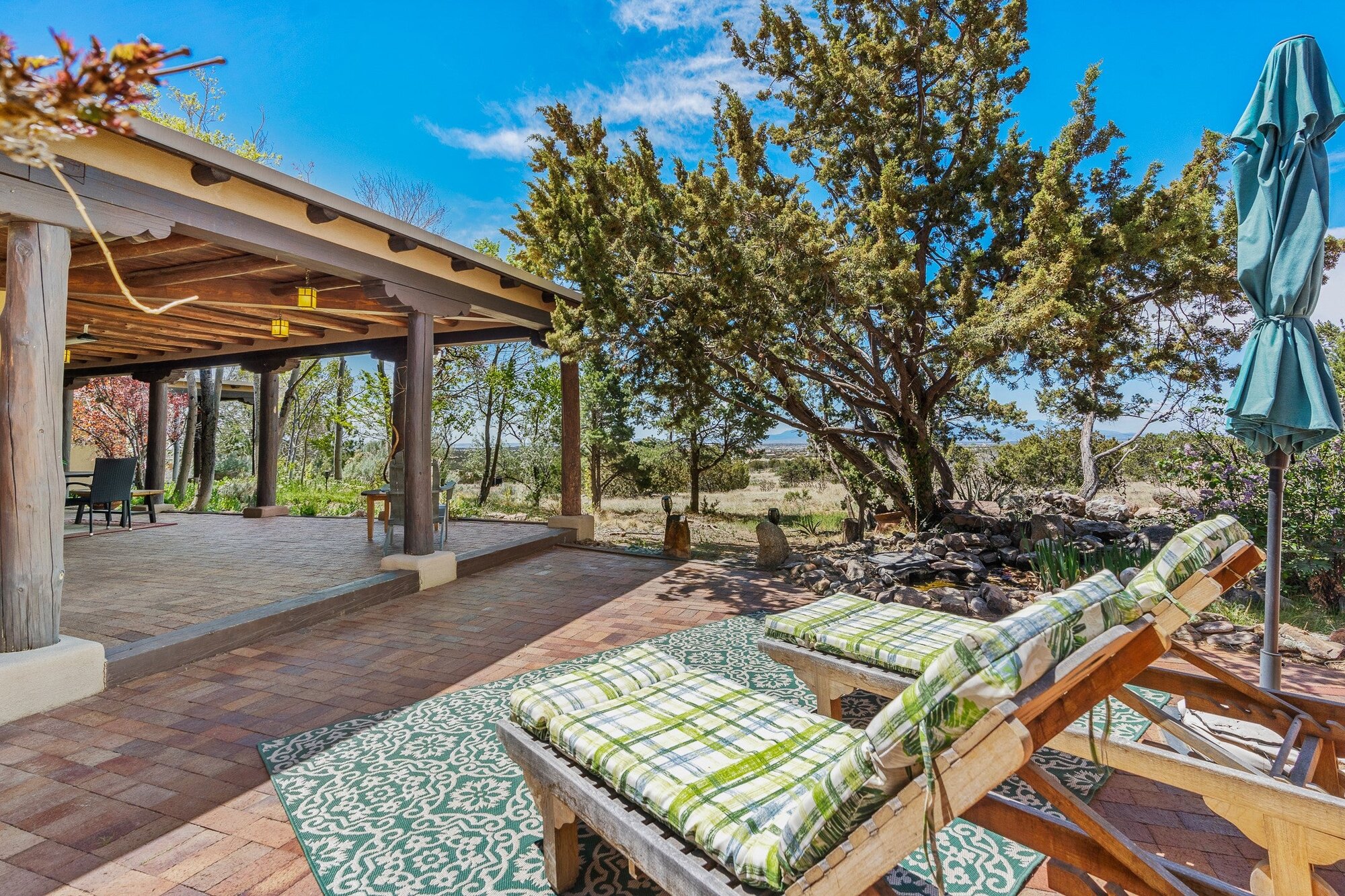 A shaded courtyard and outdoor sitting area at the ranch
